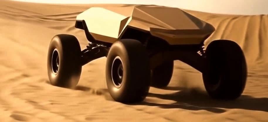 Raven unmanned ground vehicle driving across desert sand